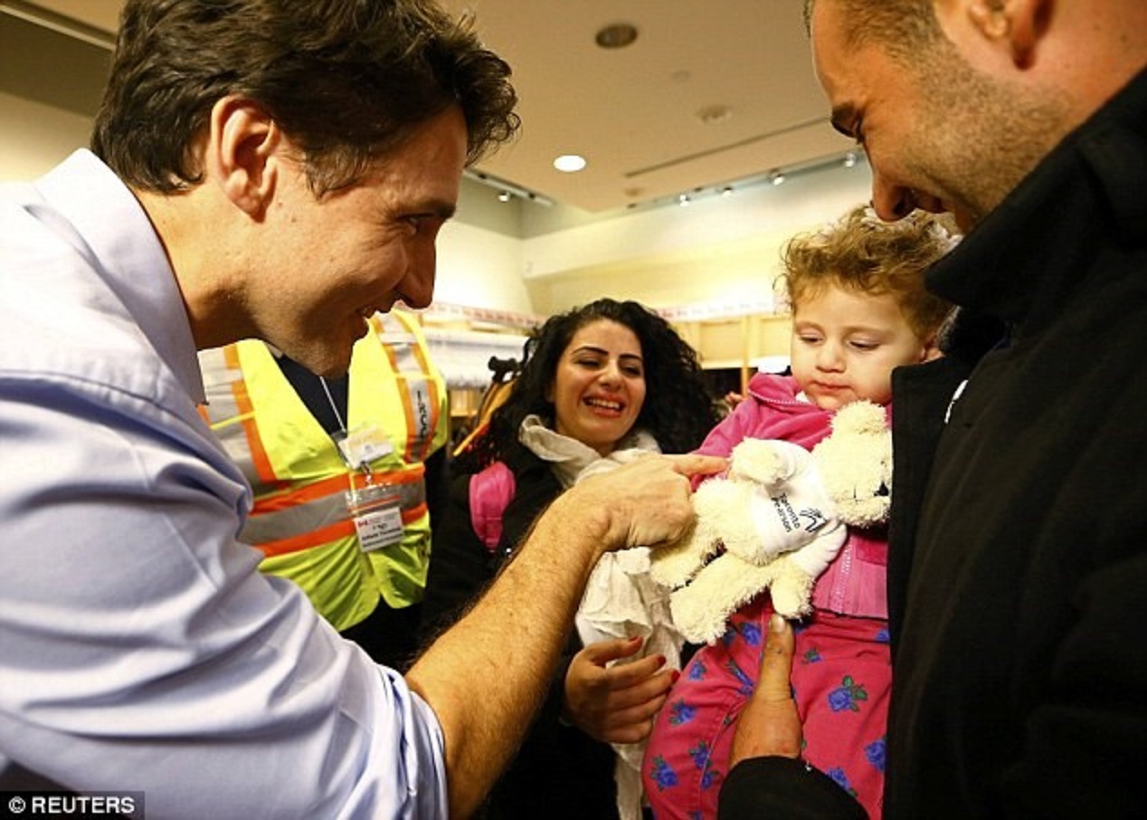 Image result for justin trudeau syrian refugees